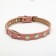 The collar is two-layer leather with rhinestones, 1.2 x 35 cm, Osh 20-30 cm, pink