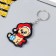 EVA keychain "Bear in the New Year's cap, with a Christmas ball" 5x3.6 cm