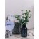 Flower composition "Eucalypt" in a bottle vase, green color / chocolate