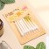Candles for the cake "Spiral", 6 pcs, white and gradient gold with white