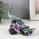 Polystone souvenir "Green peacock on a snag with a flower" 13.7x13.2x7.5 cm