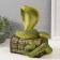 New Year's figure "Cobra on the chest" 20 x17 x 12 cm.