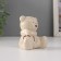 Souvenir Ceramics "Bear Bear shy in a scarf, sits" 6.5x5x6.5 cm