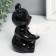 Souvenir ceramics stand "Bear with white flower" black 7x9x10.5 cm
