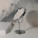 Mirror on the leg "Oval", bilateral, with an increase, mirror surface 9.4 × 11.5 cm, silver color