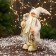 Santa Claus "with bows on shoes and with a flashlight" 30 cm, golden-white