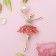 Brooch "Gymnast in a pack", red-white color in gold