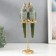 Polystone souvenir "Two green parrots on a bit" 26x10x12 cm