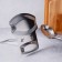 Stainless steel stand under the lid and spoon, 19.5 × 16 cm
