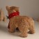 Decor "Bear in a knitted scarf with cones and berries" 12x22x19 cm