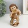 Souvenir Polystone "Angel plays on the pan-flash" golden 7x8x12.5 cm