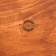 A plate of natural cedar magistro, d = 23 cm, brown color