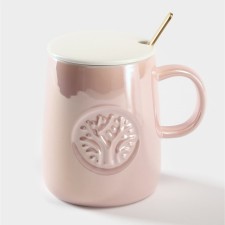 Ceramic mug with a spoon 
