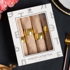 A set of napkins with a decorative. Rings 