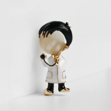 Brooch "Doctor" boy, black and white color in gold