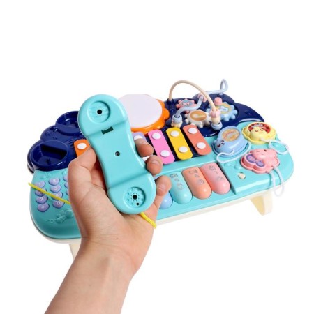Developing toy "piano", light and sound effects, works from batteries-3