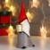Souvenir Ceramics "Santa Claus, gray caftan, red cap, with a gift" 16.5x6x6.5 cm