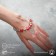 Margeri Bracelet on the thread, wood in the heart, l = 18 cm, red color in silver