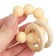 Silicone teether with a wooden ring, beige color, mum & baby