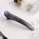 Hair clip "overflow" 10.5 cm, black