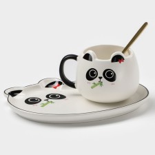 Tea couple ceramic with a spoon 