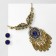 Set 2 objects: earrings, pendant “Wings”, white-blue color in black gold, 48 cm