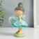 Polystone souvenir "Baby Feja in Blue, with flower" 15.5x8x8 cm
