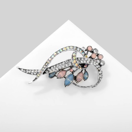 Brooch "1000 and 1 Night" curls, colored in silver