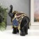 Polystone souvenir "Black elephant with color patterns on the blanket" 16x17.5x7 cm