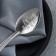 A teaspoon spoon with an engraving “Real kid”, on a gift card, 3 x 14 cm.