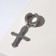 Mono-serg "Cross" with a tip, the color of silver