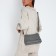 Bag Cross-Bodi with a zipper, gray color