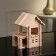 The designer is a wooden “House with a veranda”, 102 details, an array of beech