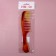 Comb, 22 × 5 cm, color "amber"