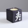 Candle in a wooden candlestick "Cube, hieroglyphs. Longevity", Eben, aroma of mango