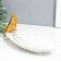 Souvenir Polystone stand "Golden parrot with a crest on a white sheet" 11x24.5x11 cm