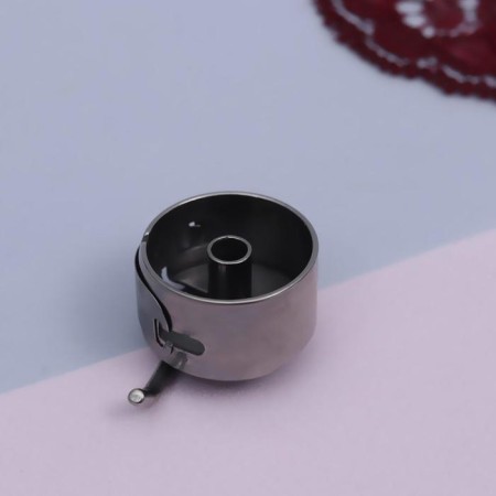 Bobbin cap to BSHM, right, 3 × 2.5 × 1.5 cm-2