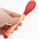 A spoon for feeding, thermal sensitive, red-beige color