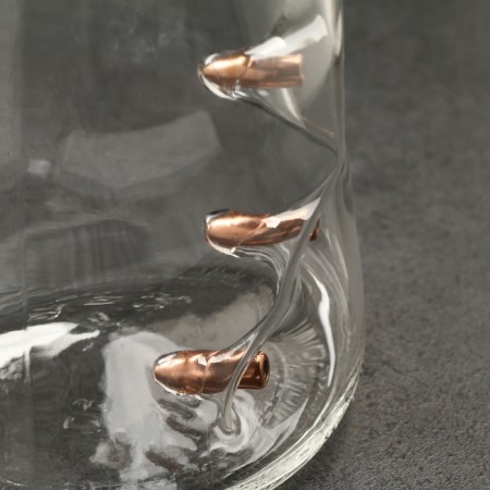 A bottle with a hillock lid "impenetrable. 3 bullets"-3