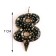Candle in the Sanata cake, number "8", black with gold stars, 5.5 cm