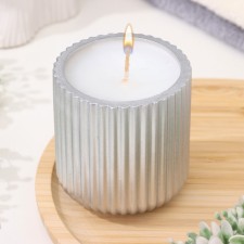 A candle in a candlelight made of gypsum with narrow faces, 7x8cm, silver