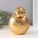 Souvenir Polystone stand "Elephant with a large stone bowl" gold 13x15x18 cm