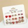 Pusets 12 pairs "Fantasy" hearts, red-white color