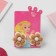 Clips children's “chosen” flower in a circle, color-brown color