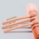 Set of makeup brushes, 4 objects, orange color