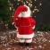 Santa Claus "with bells and with a flashlight on the staff" 30 cm, moves, red-white