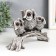 Polystone souvenir "Three Elongations with Big Eyes on the branch" 21.5x6.5x12.5 cm