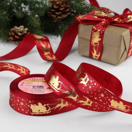 A satin tape with embossing "Deer in the harness", 25 mm, 23 ± 1 m, red color/gold No. 33