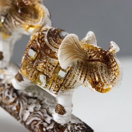 Polystone souvenir "Seven white elephants with a blanket from the Arab carpet on a horn" 11.5x31x5 cm-2
