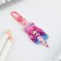Acrylic keychain "girl" with carbine, 3.2 x 5.3 cm
